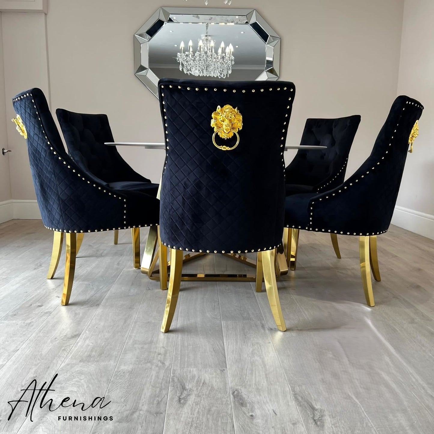 Abingdon Gold Circular White Sintered Stone Dining Table with Black and Gold Carlisle Chairs